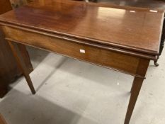 19th cent. Mahogany tea table fold over top supported by single opening back leg on square