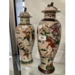 Late 19th cent. Chinese pottery vases and lids with warriors on horseback. One with brown seal mark,