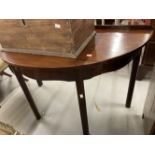 19th cent. Mahogany D end side table, the galleried top above a shaped frieze on square chamfered