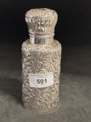 Hallmarked Silver: Cologne bottle, Birmingham 1890 with elaborate repoussage case, hinged lid, the