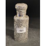 Hallmarked Silver: Cologne bottle, Birmingham 1890 with elaborate repoussage case, hinged lid, the