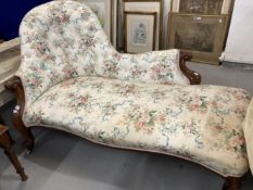 19th cent. Victorian mahogany chaise lounge upholstered in a buttoned chintz, carved scroll to the