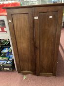 19th cent. Mahogany wall hanging cupboard two blind doors opening to reveal five small drawers