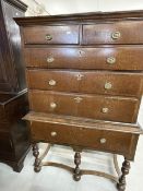 18th/19th cent. Oak two short over three long drawers on a stand with a single drawer, of small