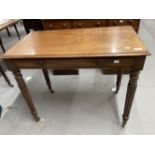 19th cent. Mahogany single drawer side table on turned and reeded legs. 34ins. x 19ins. x 28¼ins.