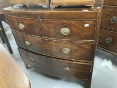 19th cent. Mahogany bow front chest of two short over three long drawers on bracket feet with oval