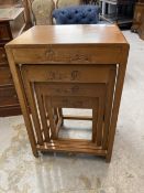 20th cent. Oriental/Chinese teak nest of four tables with carved decoration.