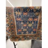 Carpets & Rugs: Caucasian, possibly Kazak, rug. Blue ground with geometric designs and six borders