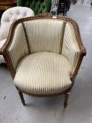 Late 19th cent. French walnut salon chair on reeded legs and striped upholstery. Width 25¾ins. Depth