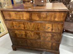 19th cent. Mahogany chest of two short and three long drawers with quarter veneered top and