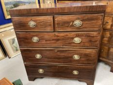 19th cent. Mahogany chest of two short and three long drawers of modest proportions on swept bracket