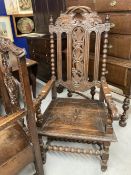 19th cent. Oak Carolean style elbow chair, carved back and seat, barley twist and carved supports.