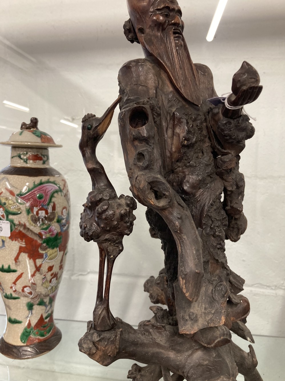 19th cent. Qing Dynasty carved rootwood figure of Shoulao shown standing holding a staff and a peach - Image 4 of 5