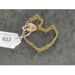 Jewellery: Yellow metal fancy gate link bracelet with padlock fastener. Tests as 9ct gold, stamped