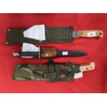 Militaria/Edged Weapons: Swiss FUM 57 bayonet and scabbard and two British post-1970s machetes. (3)