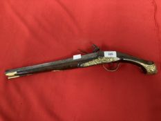18th cent. Turkish flintlock with brass decorated lock plate and pommel. 20ins.