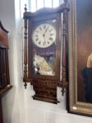 Clocks: Early 20th cent. Regulator clock with glass face and Arabic numerals.