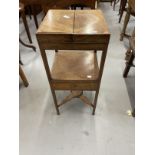 19th cent. Mahogany gentleman's washstand opening fold over top to reveal holes for wash basin