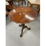 20th cent. Mahogany birdcage pie crust tilting side table on turned support terminating in tri