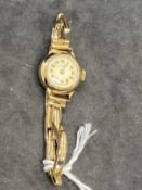 Watches: Hallmarked 9ct gold ladies Benson of London round ivory coloured dial with Arabic