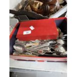 Platedware: Large selection of silver plate flatware in box.