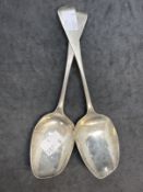 Hallmarked Silver: Two 18th/19th cent. Serving spoons, well used, London 1799-1800. Possibly Simon