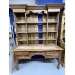 Early 20th cent. Pine knee hole table, five drawers, brass handles, on turned legs with a set of oak