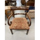 William IV 19th cent. Mahogany armchair with C scrolled arms on turned front supports and sabre