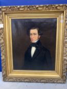 English School: Oil on canvas portrait of a gentleman, unsigned, in a shell carved giltwood frame.