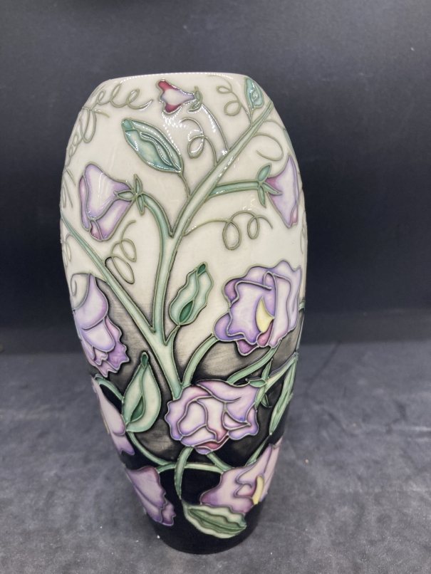 20th cent. Ceramics: Moorcroft slim ovoid shaped vase in the Sweet Pea pattern on black and ivory - Image 2 of 3