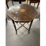 Edwardian octagonal inlaid table the top with inlaid central panel on square legs, tied stretcher