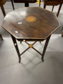 Edwardian octagonal inlaid table the top with inlaid central panel on square legs, tied stretcher