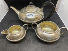 Hallmarked Silver: Three piece tea set, Chester 1909. Approx. 34oz.