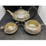 Hallmarked Silver: Three piece tea set, Chester 1909. Approx. 34oz.