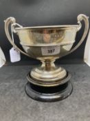 Hallmarked Silver: Prize trophy inscribed Letchworth Hall 4th June 1929, on treen stand. 11ozt.