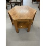 20th cent. Hardwood hexagonal coffee table on six legs with under tier. 31ins. x 22½ins.
