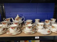 20th cent. Ceramics: Royal Albert Country Rose pattern teacups and saucers x 6, teapot, milk jug,