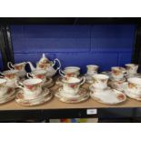 20th cent. Ceramics: Royal Albert Country Rose pattern teacups and saucers x 6, teapot, milk jug,