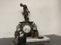 19th cent. French Spelter mounted marble mantel clock with white enamelled face. The figure with