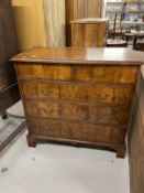 19th cent. Mahogany chest of two short and three long drawers with quarter veneered top and