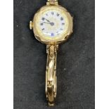 Watches: Hallmarked gold 375 Bird in Ring ladies wristwatch, cased and bracelet stamped. 18g