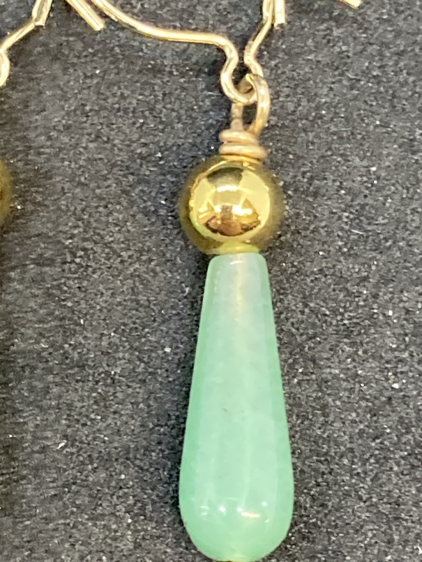 Jewellery: Yellow metal drop earrings each set with a pear shaped jade. Test as 18ct gold. Weight - Image 2 of 2