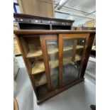 19th cent. Mahogany two door cabinet, moulded cornice above two glazed sliding doors with three