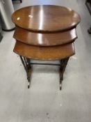 19th cent. Mahogany nest of three tables of delicate form, turned supports below oval tops with