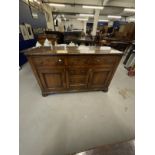 19th cent. Sideboard three drawers above two door cupboard with a central bank of false drawer