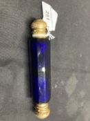 19th cent. Blue glass scent bottle with gilt hinged cover. Dia. 1?ins. Length 5½ins.