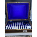 Hallmarked Silver: Set of six dessert knives and forks with mother of pearl handles in fitted case