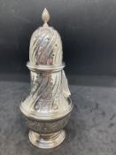 Hallmarked silver sugar sifter with floral decoration. Hallmarked London 1972. 6½ins. Weight 4.