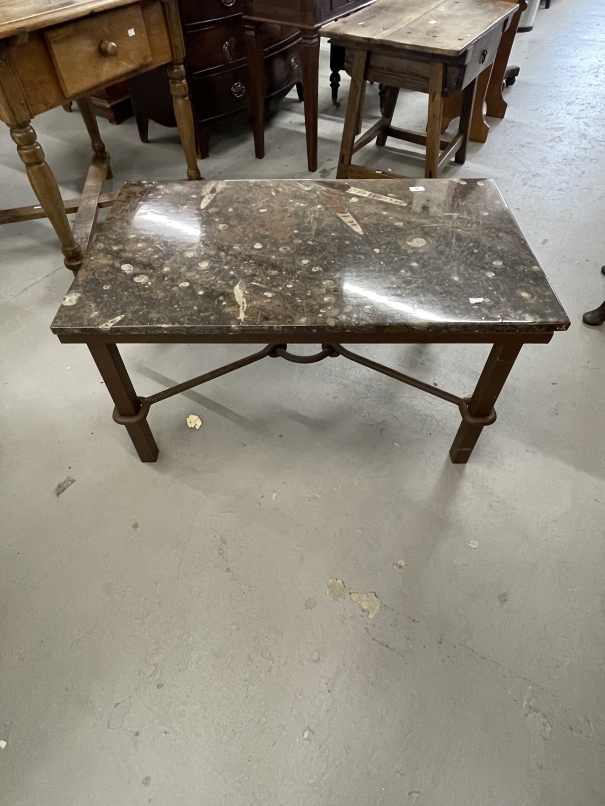 20th cent. Fossil marble coffee table on iron base with four iron stretchers connected with a