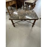 20th cent. Fossil marble coffee table on iron base with four iron stretchers connected with a